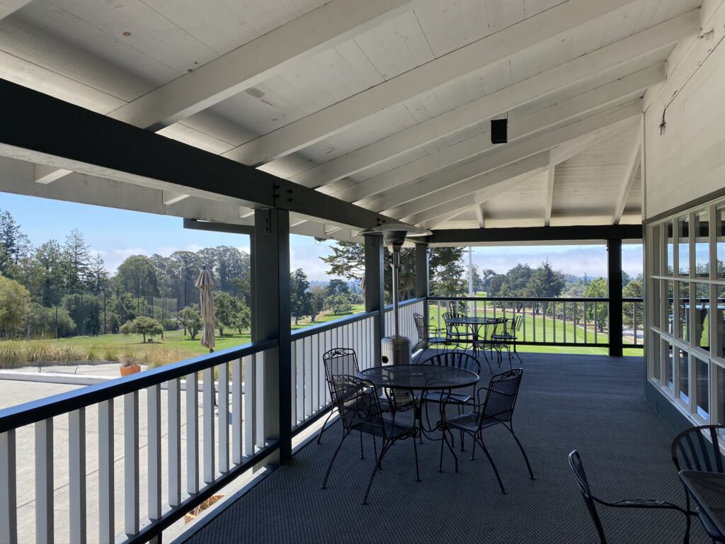 Enjoy a drink on the deck at Pasatiempo Golf Course